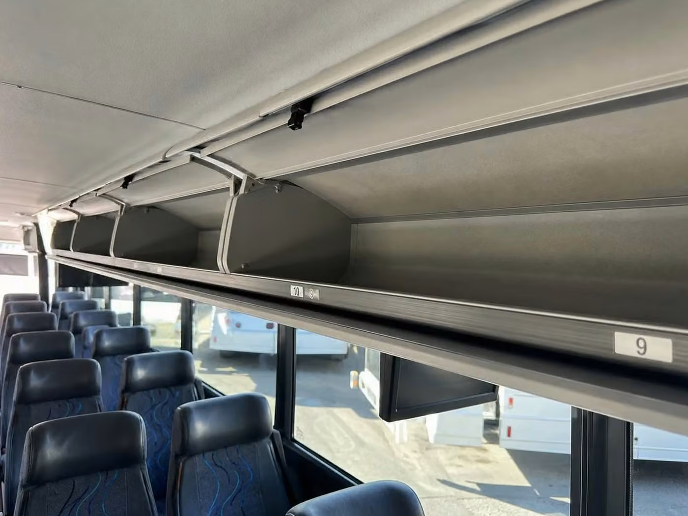 adelanto 18 passenger minibus overhead storage