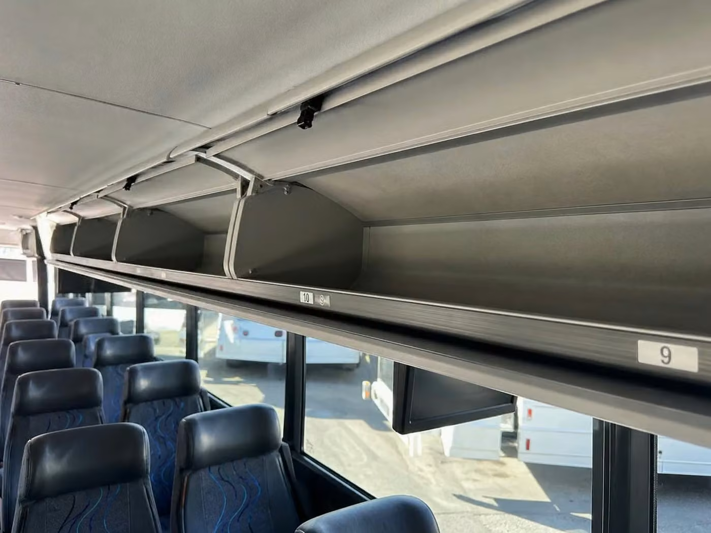 adelanto 25 passenger minibus overhead storage