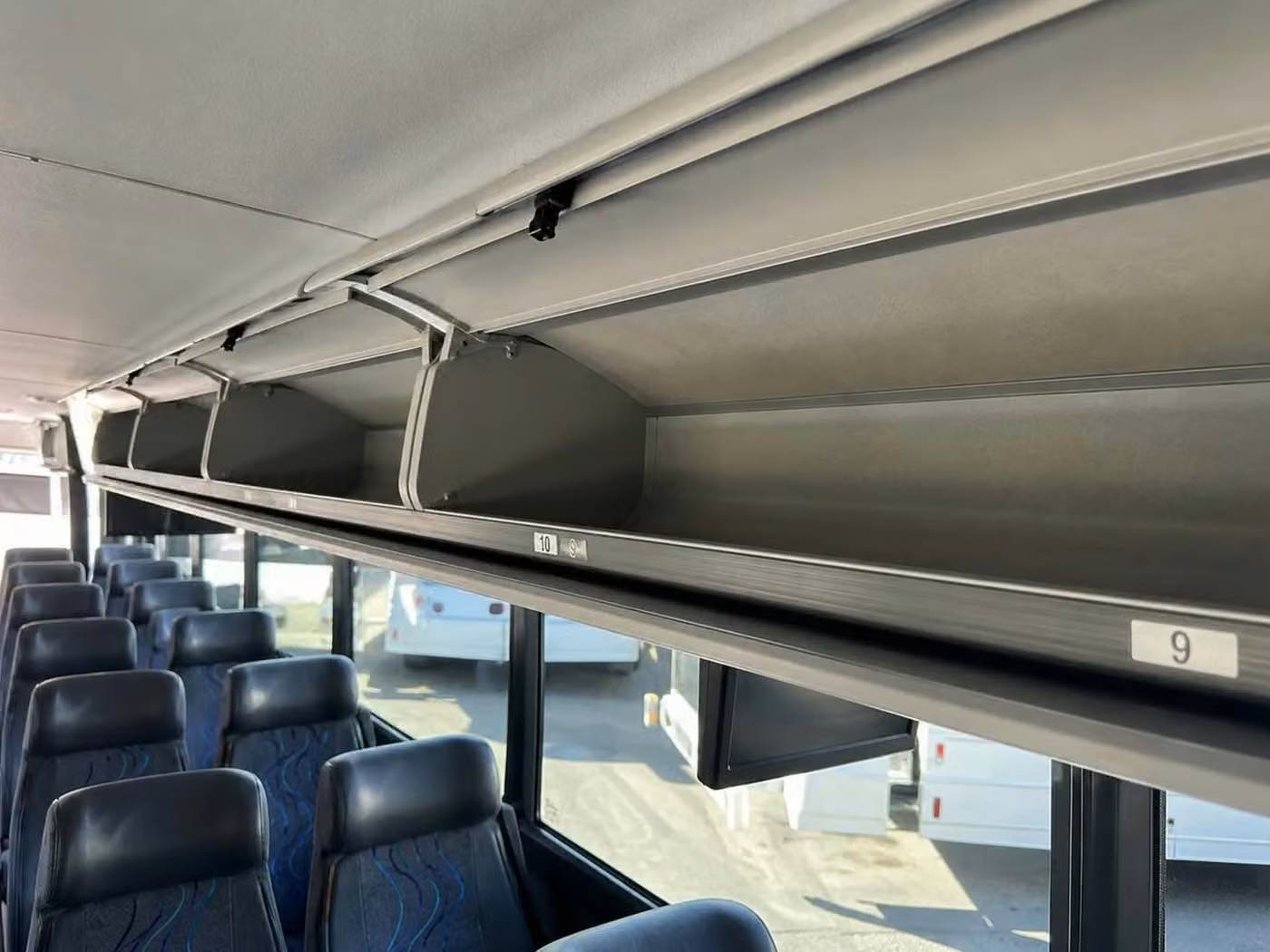 adelanto 35 passenger minibus overhead storage