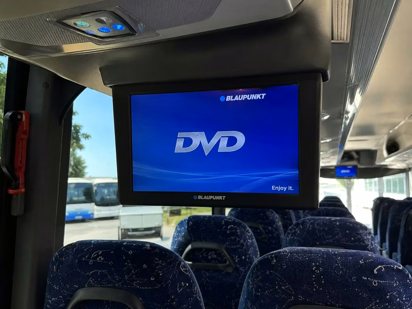 adelanto 56 passenger charter bus tvs